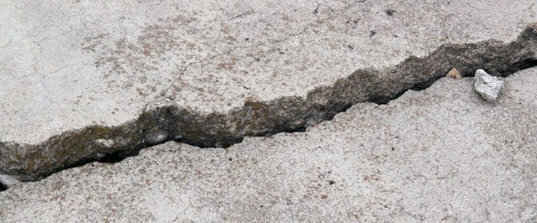 Cracked concrete in need of repair